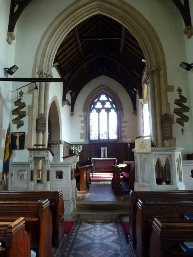 Aisle and altar in St Esprit in Marton.